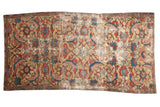 Antique Persian Sultanabad carpet, dramatic serrated leaf design on a gold field with vibrant colors.
