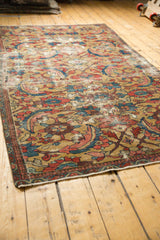 Antique Sultanabad Mahal rug showcasing gold field and expressive serrated leaf design.