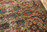 Detail of an antique Persian Sultanabad rug with dramatic serrated leaf design on a unique gold field.