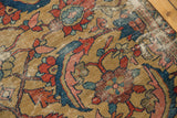 Aged gold field with expressive serrated leaf pattern on an antique Sultanabad rug.