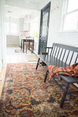Antique Persian Sultanabad rug showcasing oversize serrated leaf design on a unique gold field.