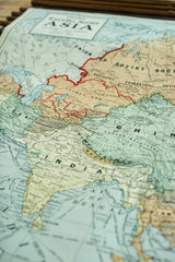 Vintage 1938 Cram's map detail highlighting India and China in subdued colors.