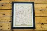 Antique 1881 Bedford, New York map, light pink and aged white, in a black wooden frame.