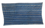 Collectible hand woven indigo textile throw with diverse blue horizontal stripes. 3'2