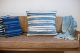 Finely handwoven vintage African indigo pillow, light blue and ivory stripes with storied character, 24x24.