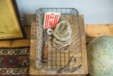 Mid Century Gym Locker Wire Basket interior, displaying industrial tags and coiled string.
