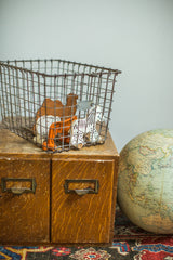 Vintage Fred Medart gym locker wire basket, original metal tag, holding toys.