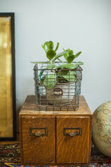 Vintage wire basket with galvanized metal and subtle old blue spray paint.