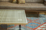 Handmade Mod Square Table's finely crafted grid top and natural wood corner.