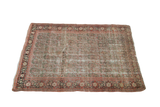 Distressed Antique Senneh Persian rug, intricate allover boteh pattern, muted tones.