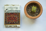 Metropolitan Museum of Art CoasterRug, ruby red and gold floral arabesque with tendril design.