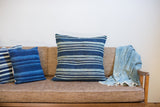 Large 24x24 dark indigo blue pillow with handwoven striped vintage textile.
