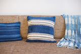 Handwoven Indigo Mudcloth Throw Pillow featuring thick denim blue, white, and grey stripes, 16x16.