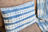 Batik Indigo Lumbar Pillow featuring faded blue and white striped design, 12x20.