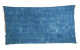 Collectible vintage African indigo cotton textile with unique batik pattern.