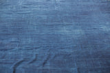 Collectible vintage African indigo textile, hand woven, denim blue with subtle texture, 4x6 feet.