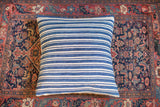 Finely woven dark blue and off-white striped vintage indigo pillow detail.