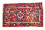 Red, ivory, and blue vintage Karaja rug with a central geometric medallion, 2'1