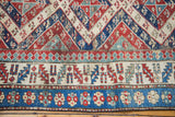 Distressed antique Bijar runner with vibrant geometric and floral border motifs.