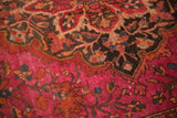 Vintage Farahan Sarouk rug detail, finely knotted with ruby magenta and charcoal floral patterns.