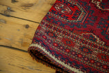 Intricate geometric border patterns and new selvage of an antique Turkmen tent cover.