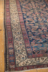 Persian Hamadan rug's antique ivory Serbend border with indigo blue allover Herati field.