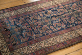 Antique Hamadan rug with indigo Herati field, abstract birds, and meandering ivory Serbend border.
