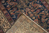 Tightly woven hand-knotted foundation and fringe details of an antique Hamadan rug.