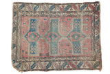 Antique Avar rug showcasing softened rose and blue geometric patterns, distressed, 3'6
