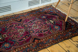 Brilliant blue border, secured edge, and fringe of the Vintage Lilihan rug.