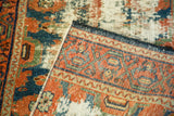 Antique Lilihan runner: distressed pile exposing ivory foundation with colorful geometric borders.