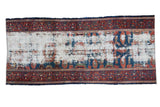 Antique Lilihan runner with distressed ivory-grey foundation, faded blue and rust floral motifs, intact main borders, 2'8