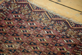 Repeating geometric guls and fine wool and silk texture on an antique Turkmen Chuval rug.
