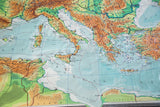 View of vintage Europe map showing relief texture, subdued blue seas, and detailed landmasses.