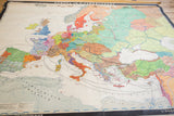 Vintage 12th Century Europa map, angled view with vibrant colors and top browning.