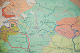 Vintage 12th Century Europa map section with German text and colored territories.