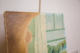 Detail of Mid Century painting, mint green interior, and light blue window pane.