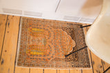 Hand-knotted corner of antique Tabriz prayer rug, intricate borders, orange tree-of-life field.