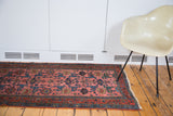 Vintage Lilihan rug fringe, dusty rose field, and blue allover Gerrus design.