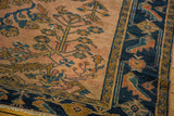 Antique Lilihan rug's navy blue border with distinctive gold turtle samovar motif.