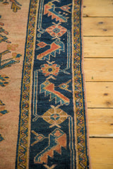 Navy blue side border displaying stylized turtle samovar motifs in rosy pink, gold, and bronze.
