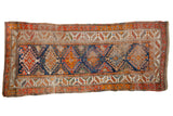Antique Caucasian runner rug with colorful geometric medallions in blue, orange, red, 3'9