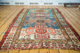Unique outer geometric border of an antique Southern Caucasian rug, with rose, ivory, and bronze patina.