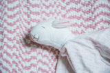 Organic cotton baby sheep's embroidered face, pink ears, and soft patterned sleep blanket.
