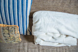 Super soft organic cotton king blanket, featuring a plush, natural off-white texture.