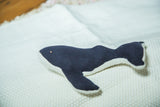 Organic cotton stuffed humpback whale, dark blue and off-white.