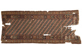 Antique Shirvan rug runner with bold diagonal stripes in rose, blue, and tan within a complex geometric border.