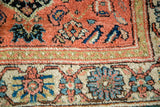 Vintage Malayer hand-knotted rug border, showcasing peachy orange, ivory, blue, and mallard green patterns.