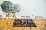 Vintage 1930s Kurdish rug mat, unusual oblong medallion, floral patterns in peach, madder red, teal.