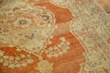 Fine weave showing the low pile and ornate floral motifs of an antique collector rug.